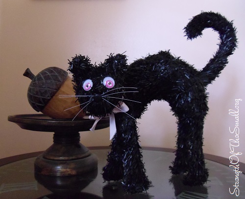 Black Tinsel Cat.