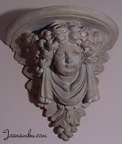 Cherub Wall Shelf Sconce.